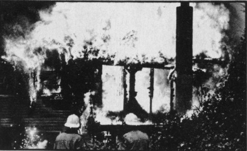 Image: fully involved structure fire, resulting from woodstove fire